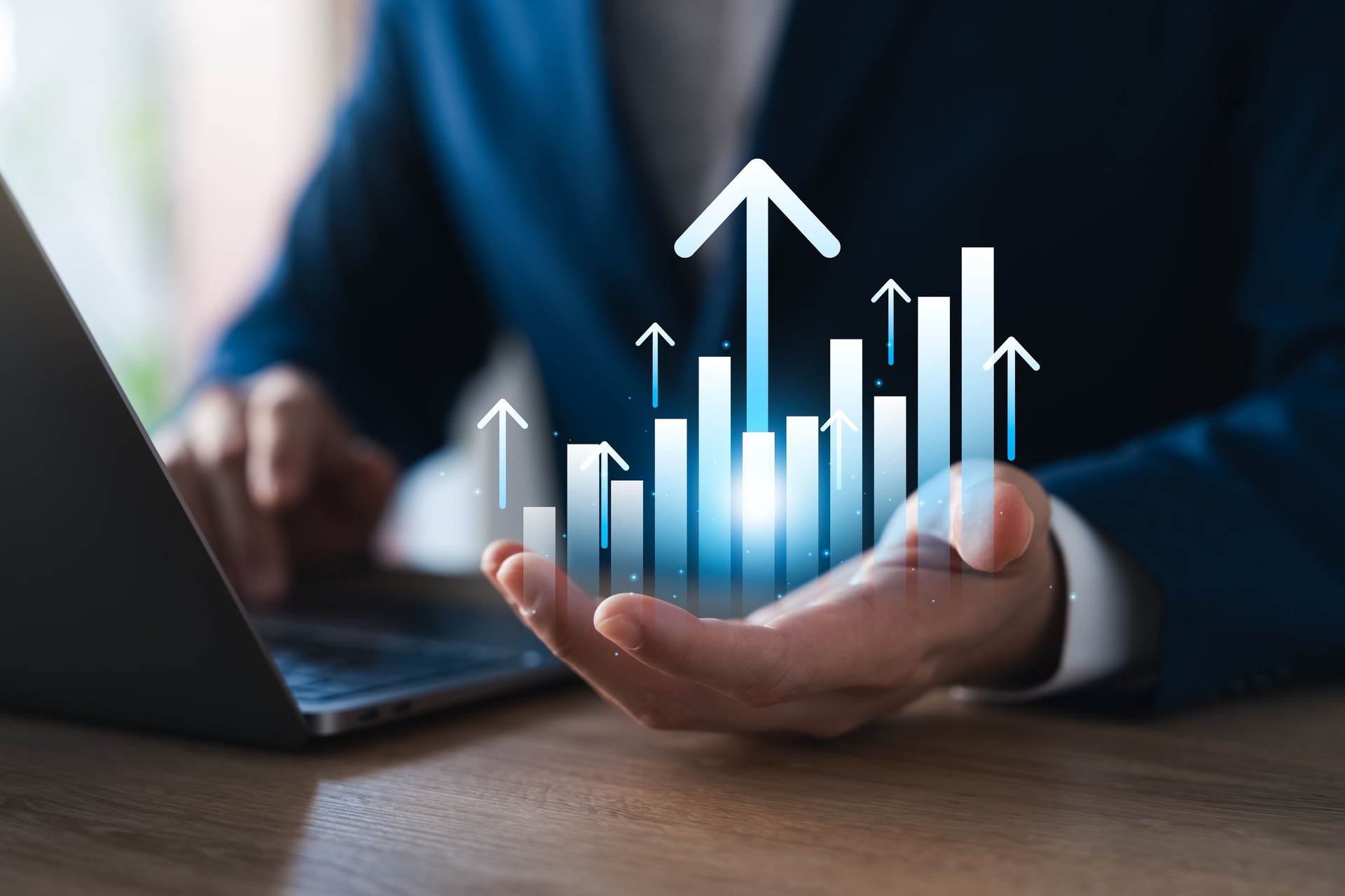 business growth chart Up arrow sign, businessman hands showing graph with up arrow, company growth.